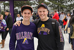 Two students smiling. Links to Donor-Advised Funds