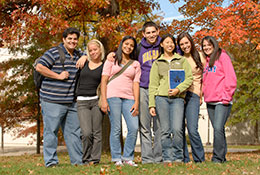 A group of students smiling. Links to Gifts by Will A